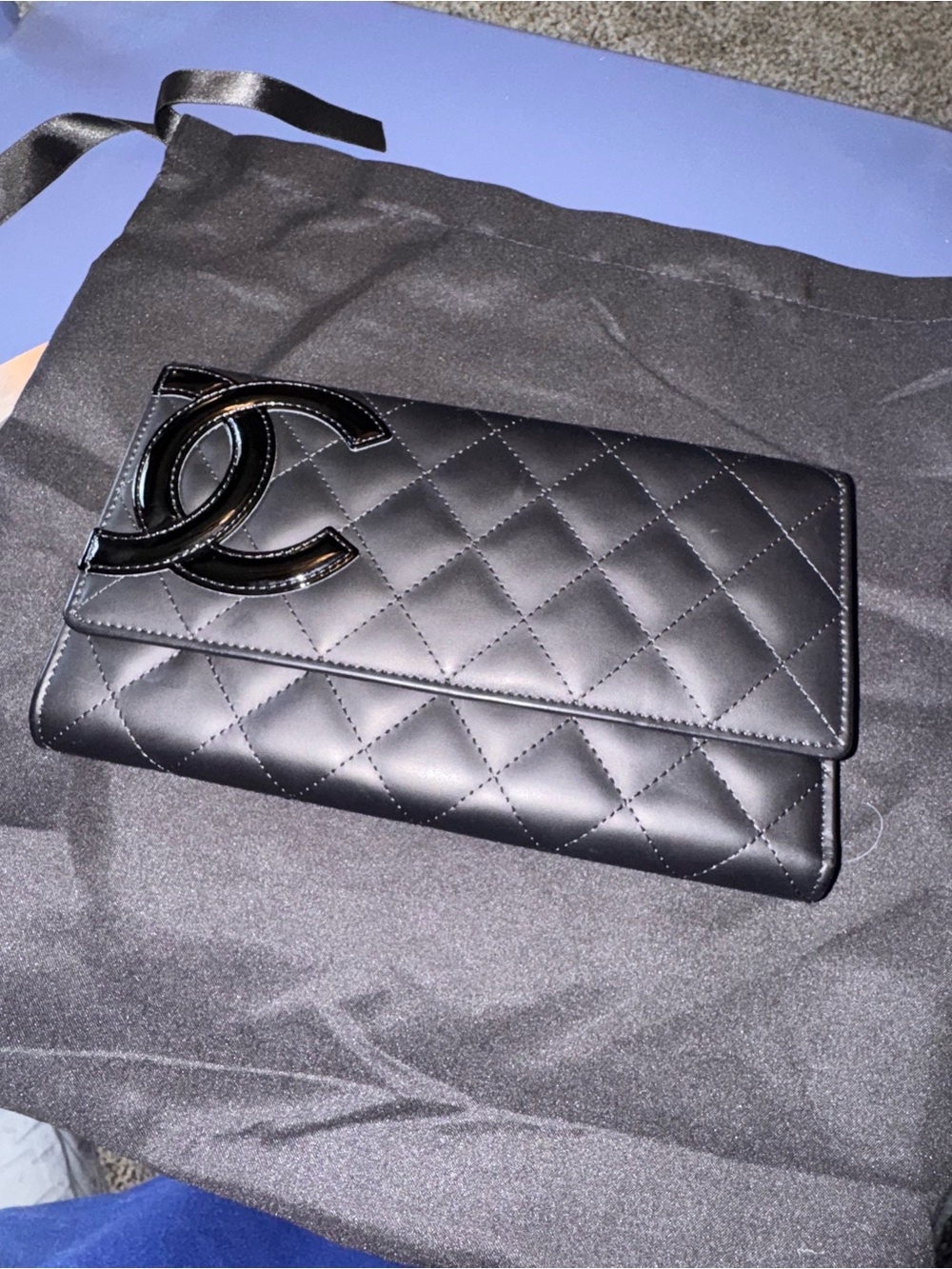CHANEL Black Leather Mini Bag with Interlocking Logo